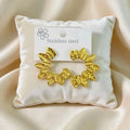 Aretes hojas mitad