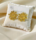 Arete girasol