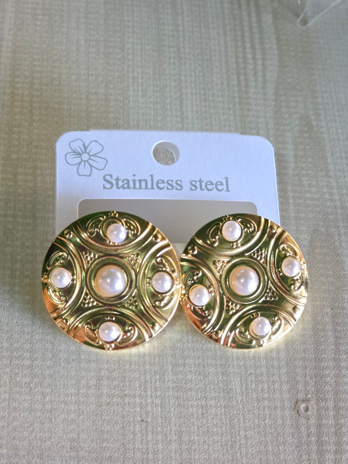 Aretes dorado acero